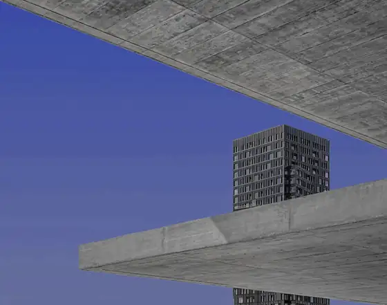 Volúmenes de hormigón marrón bajo un cielo azul