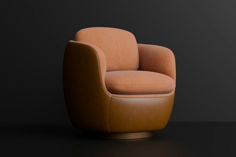 Brasa, sillón tapizado en cuero y paño